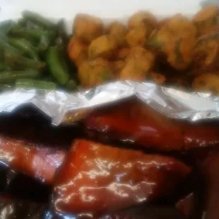 Green beans , fried okra  and bbq ribs and chicken and cornbread