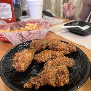 a plate of fried chicken