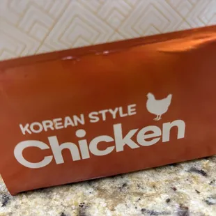 The logo on to-go box