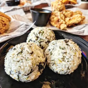 three fried chicken patties on a plate