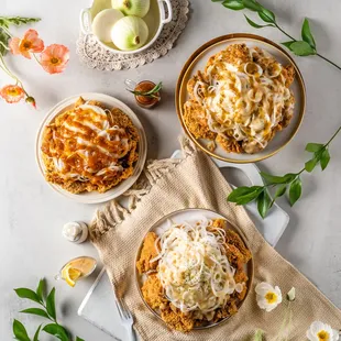 three plates of food on a table