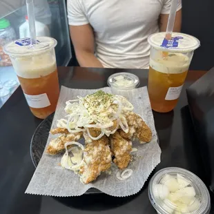 This photo shows the chicken with the onions on top. Highly recommend. We also got passionfruit and mango Boba.