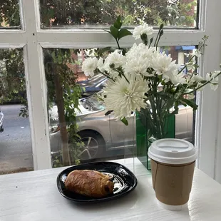 Dine in the beautiful ambience: breakfast tea and croissant