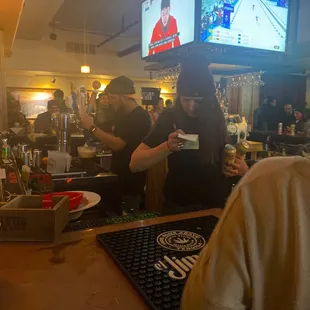 a man and woman at a bar