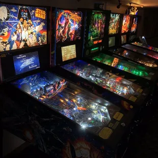 a row of pinball machines