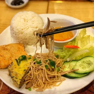 Rice plate with shredded pork skin, egg cake, and fried shrimp cake