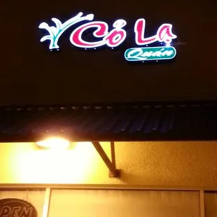 a neon sign for a restaurant