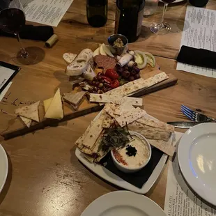 a plate of food and wine