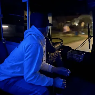 Groom sitting next to driver the entire time