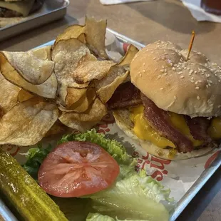 Bacon cheeseburger and homemade potato chips.  Very good smoky tasting burger.