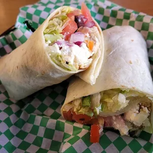 Greek Wrap with Grilled Chicken, Sliced Cucumbers, Mixed Greens, Red Onion, Lettuce, Tomato and Feta Cheese with house Greek Dressing