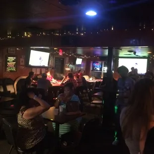 a group of people sitting at tables