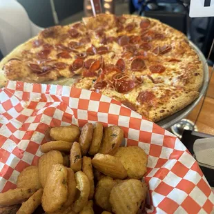 Delicious fried pickles and pepperoni pizza