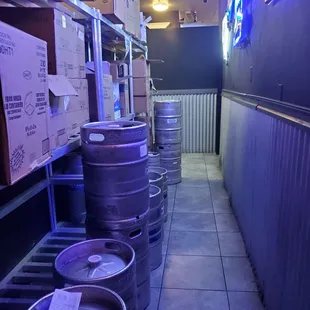 Hallway to the men's restroom. 18" walkway with open box wings ready to take your eye out.