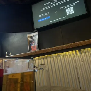 a glass of beer on a table