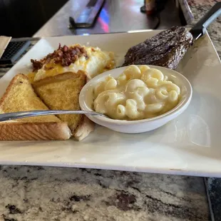 Sirloin with loaded mashed potatoes Mac and cheese with Texas toast.