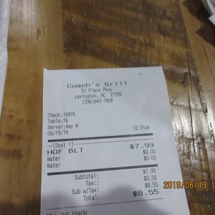 Coach’s Neighborhood Grill / Lexington: My check for an order that spanned lunch and breakfast.