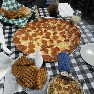a pizza and fries