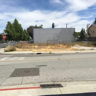 Direct across the street. High end expensive Sushi place closed down.