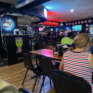 a woman sitting at a table