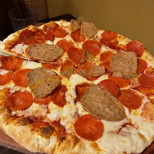 a pepperoni and sausage pizza