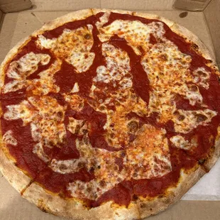 Paid for extra sauce. I should get a refund for lack of cheese. Looks like a picture of the globe looking down from the top.