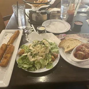 My meal: mozzarella sticks, Caesar salad, and meatballs.