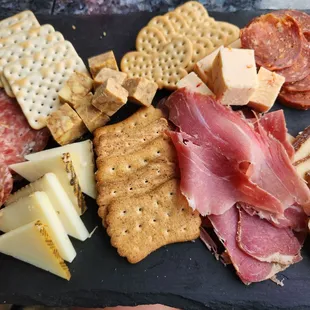 Charcuterie Board. Usually comes with olives. I said no olives.