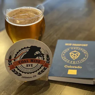 a pint of beer and a passport