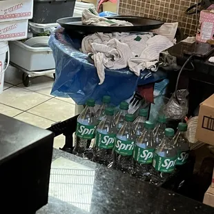 Dirty rags, dirty dishes and general filth behind the checkout register and into the kitchen.