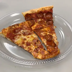 two slices of pepperoni pizza on a plate