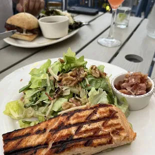 Apple brie salad with salmon, and steak sandwich
