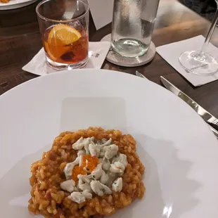Tomato Rice Rissotto with crab and andouille sausage topped with smoked trout roe