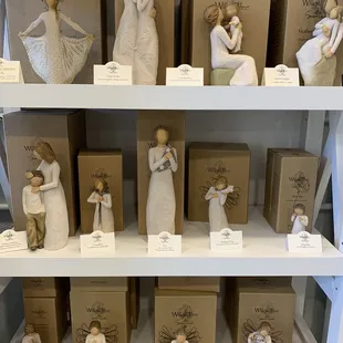 a display of figurines on a shelf
