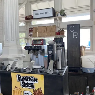 a coffee bar with coffee machines
