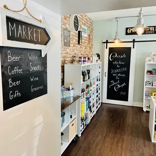 a coffee shop with a chalkboard sign