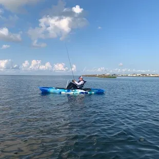 Fishing with grandson in a CBY kayak.