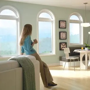 Enjoying the view of her new windows