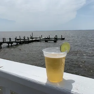 View from outside tables. Nice local draft lager brewed by a group of ex green berets.
