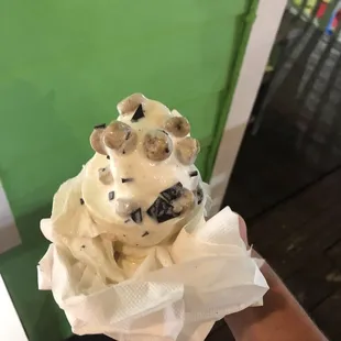  cone of ice cream with chocolate chips on top