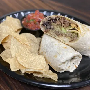 Mexicano Burrito with Steak, Jack Cheese, Cilantro Lime Rice and/or Organic Quinoa,  Black Beans, Onions, Cilantro and Salsa Verde.