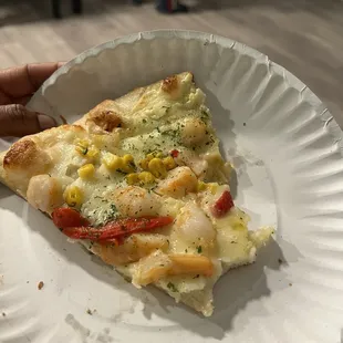 "Coastal pie" pizza slice