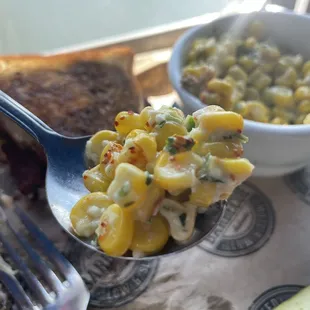 a spoon full of macaroni and cheese