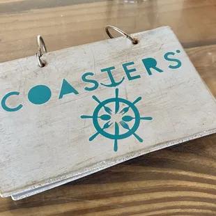 a close up of a sign on a table