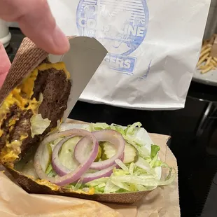 The Coastline Burger stuck to the lid