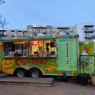 a food truck parked in front of a building