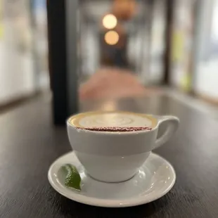 a cappuccino on a saucer