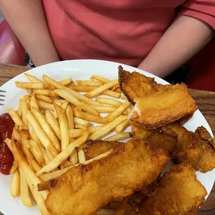 Crispy fries and catfish fillets