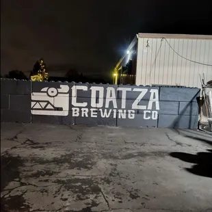 a truck parked in front of a building