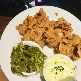 Fried chicken with collard greens and mashed potatoes